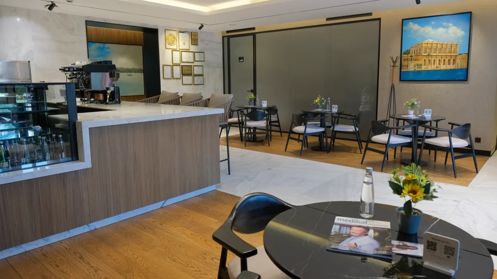 The ground-floor waiting area, where the day starts and the results review ends.